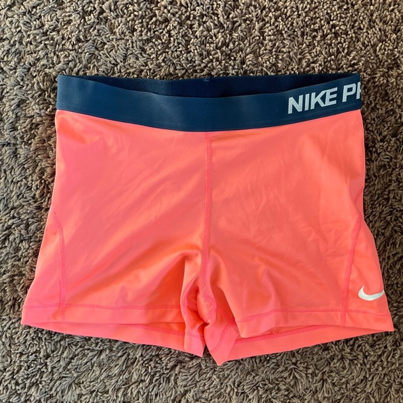 coral nike pros